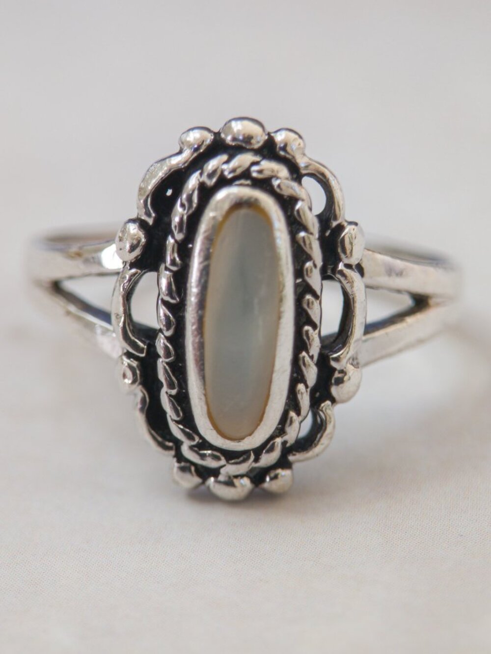 Sterling Silver Mother-of-Pearl Ring, Sz 6.5 — elongated oval, split shank